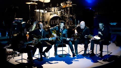 Musicians playing instruments on stage