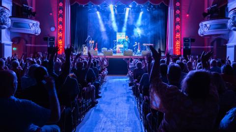 An image of the stage at King's Hall from the audience