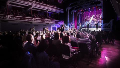 Audience enjoying a show at St George's Hall.