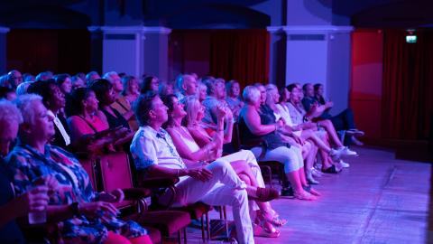 Audience enjoying a show at St George's Hall.