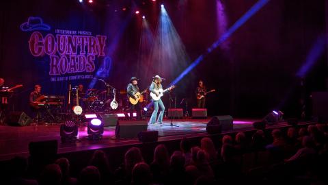 Country Roads performing on stage