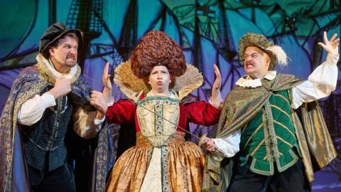 Three Horrible Histories Live cast members dressed in Tudor outfits.