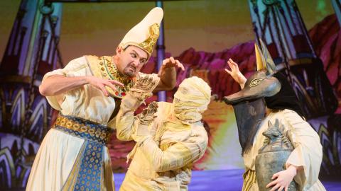 Three cast members in Horrible Histories live dressed as Egyptian characters.
