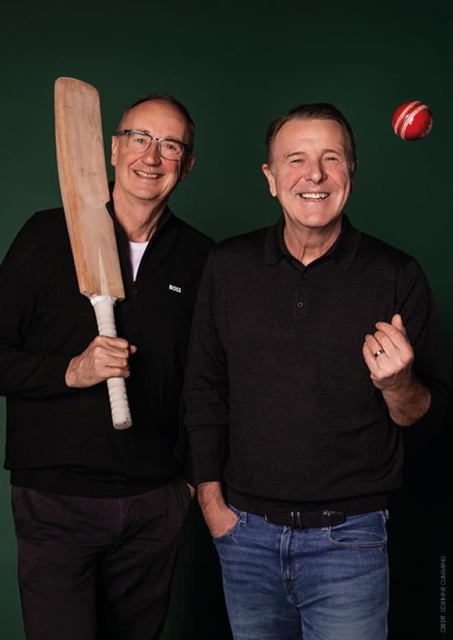 Sportsmen Tuffers and Aggers stand against a dark green background wearing casual clothes and holding a cricket bat and ball.