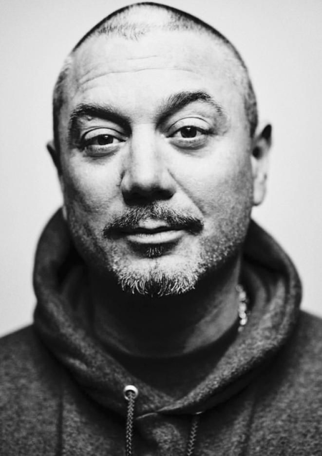 A close up, black and white image of radio host and DJ Huey Morgan.
