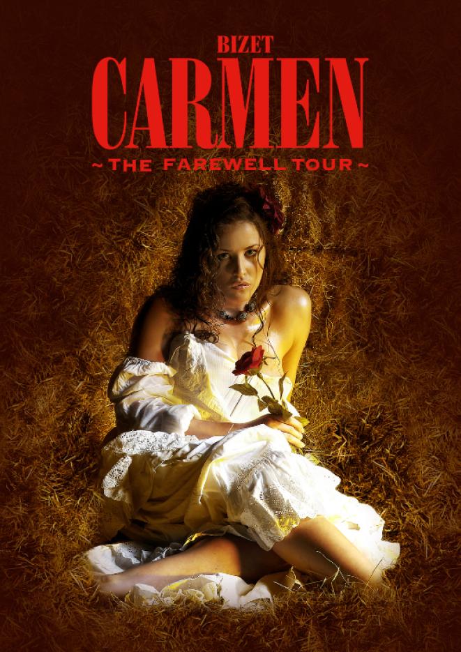 A woman wearing a white dress lays on a stack of hay, red text above reads Carmen.