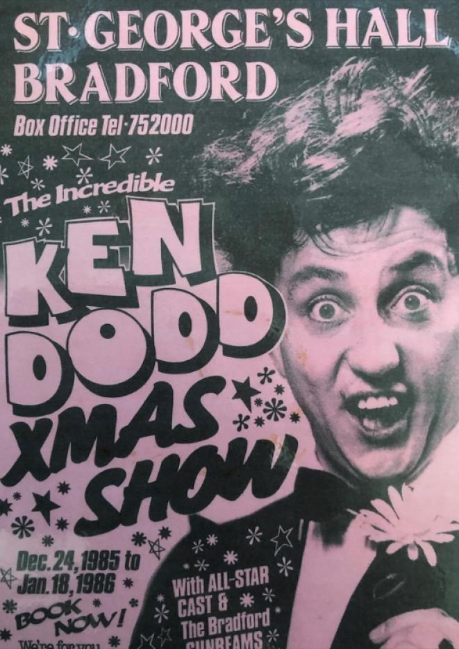 An old poster of Ken Dodd's Christmas Show with a portrait of Ken.