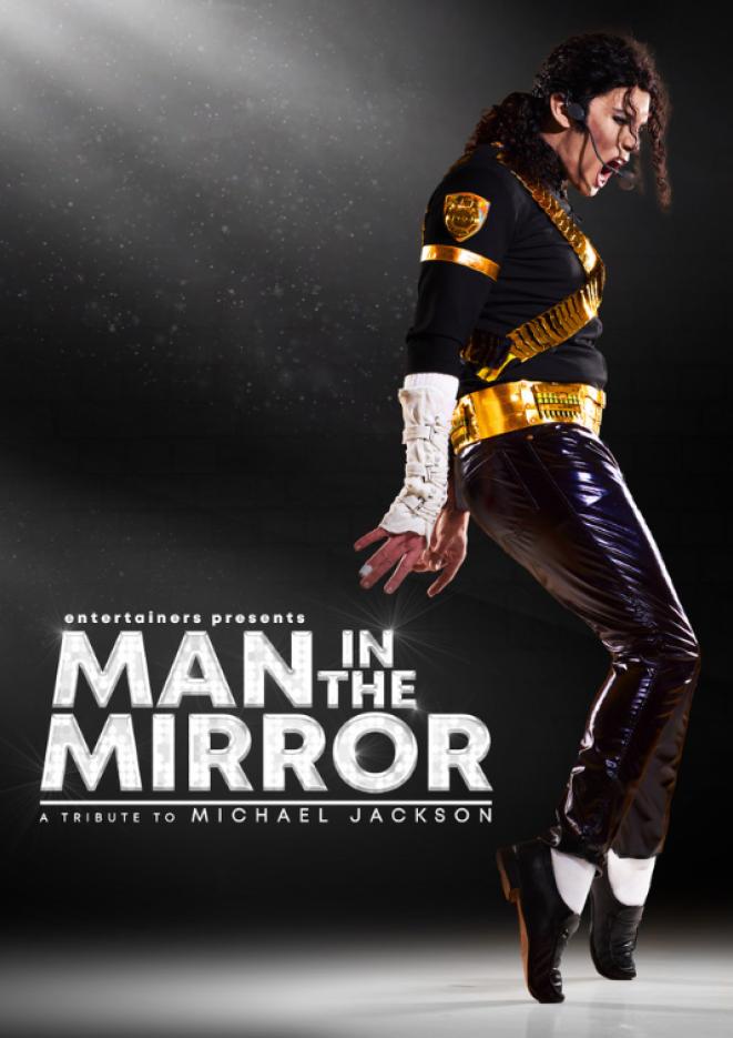 A man dressed as Michael Jackson in a black and gold outfit does the moonwalk